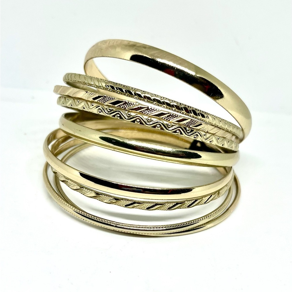 Gold Tone (9) Bangle Bracelets